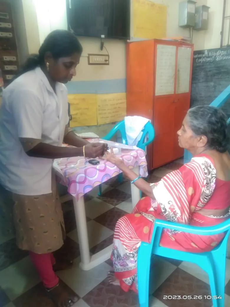 A caregiver assisting a resident with a meal