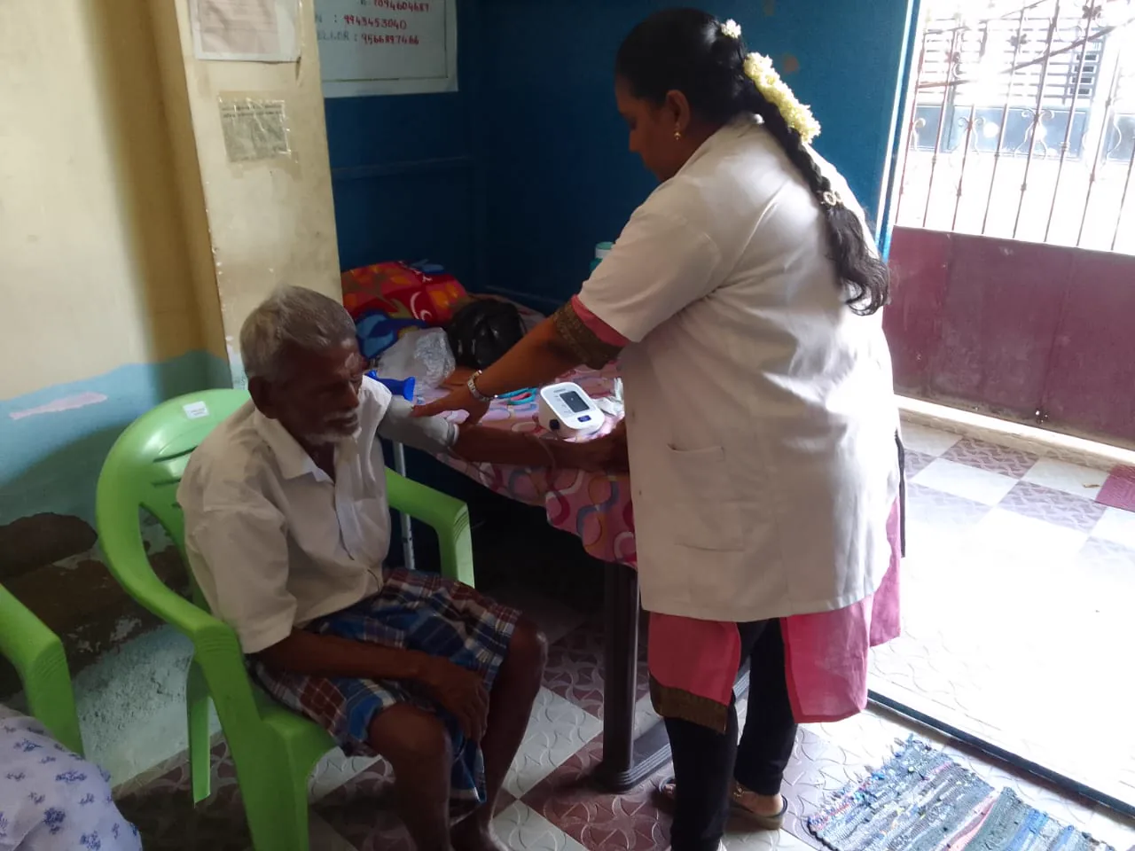 A nurse caring for a resident in a quiet room