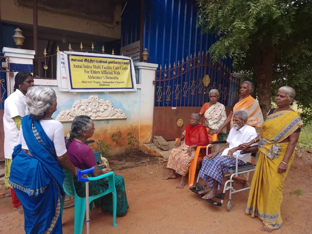 Residents and staff gathered together at the AIPMS home